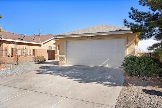 single story home featuring a garage