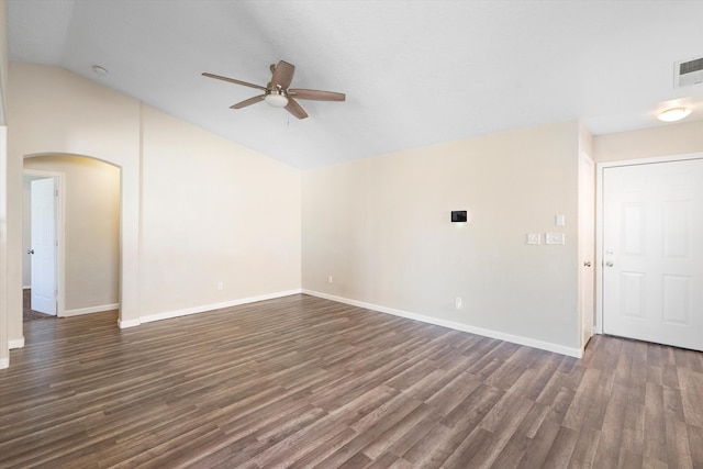 unfurnished living room featuring dark wood-type flooring, ceiling fan, and lofted ceiling