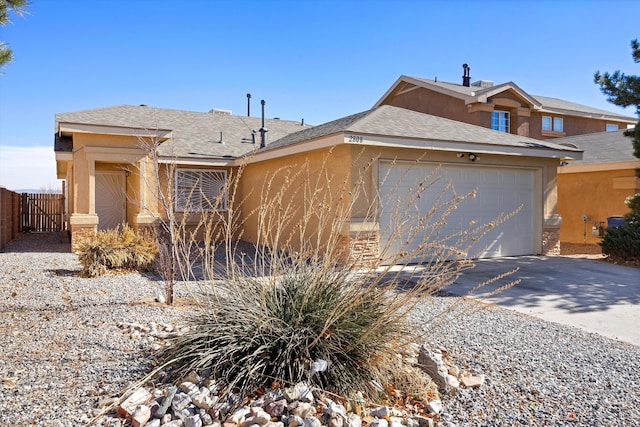 ranch-style home with a garage