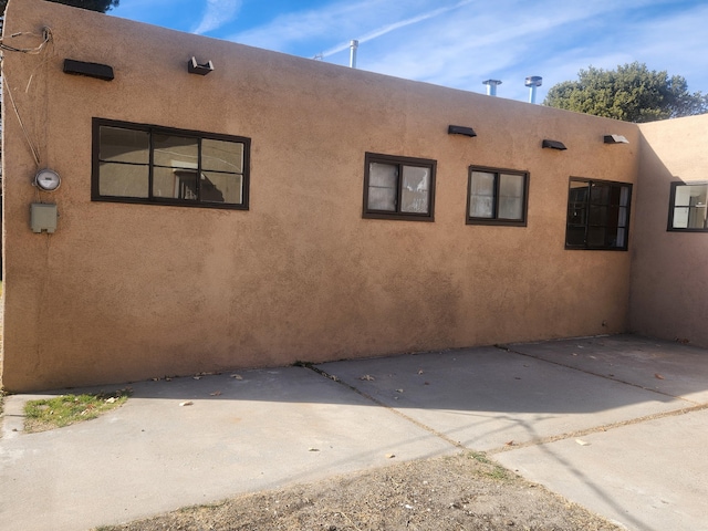 back of house with a patio area