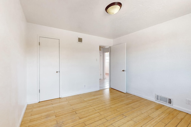 empty room featuring light wood-type flooring