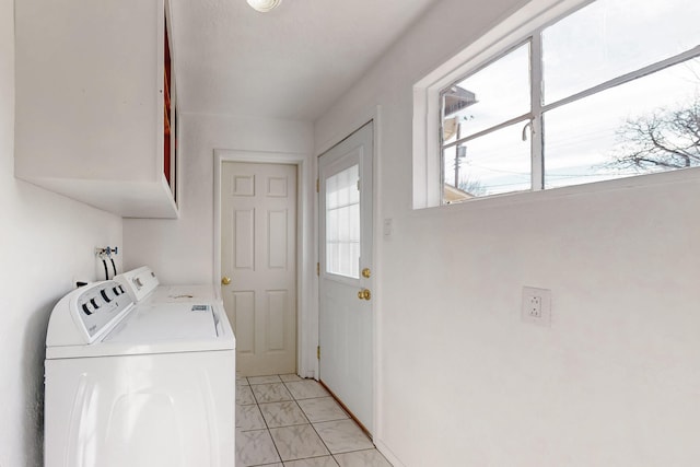 laundry area featuring cabinets and independent washer and dryer