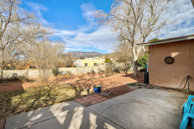 view of patio / terrace with a mountain view