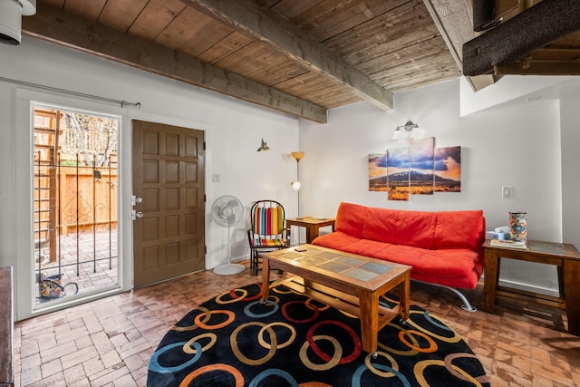 living room featuring wood ceiling and beam ceiling