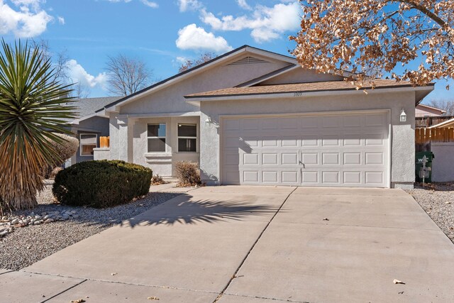 single story home featuring a garage