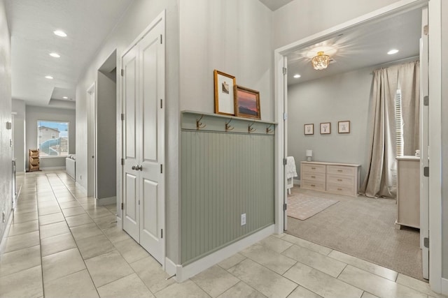 hallway with light tile patterned flooring