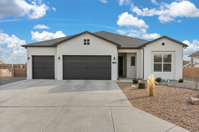 ranch-style home with a garage