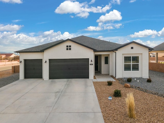 ranch-style home with a garage