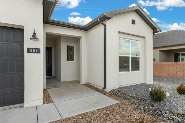 property entrance featuring a garage