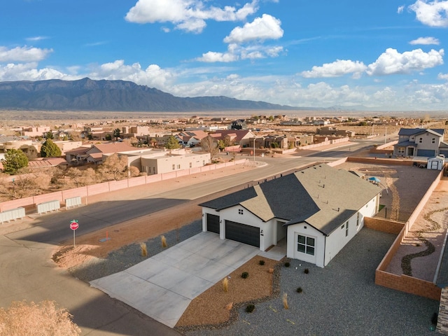 drone / aerial view featuring a mountain view