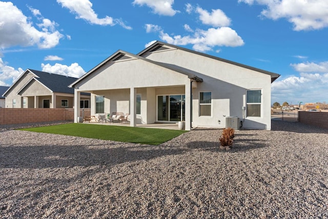 rear view of property with a patio