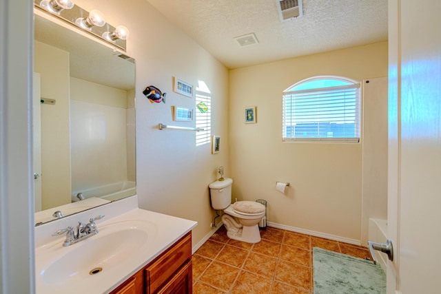 full bathroom with toilet, a textured ceiling, shower / bathtub combination, vanity, and tile patterned flooring