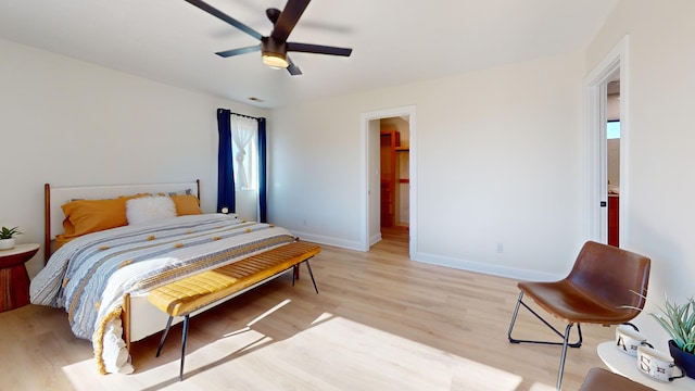 bedroom featuring ceiling fan and light wood-type flooring