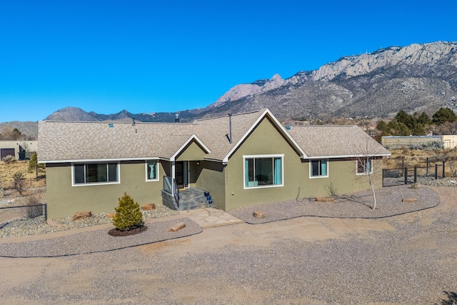 single story home with a mountain view