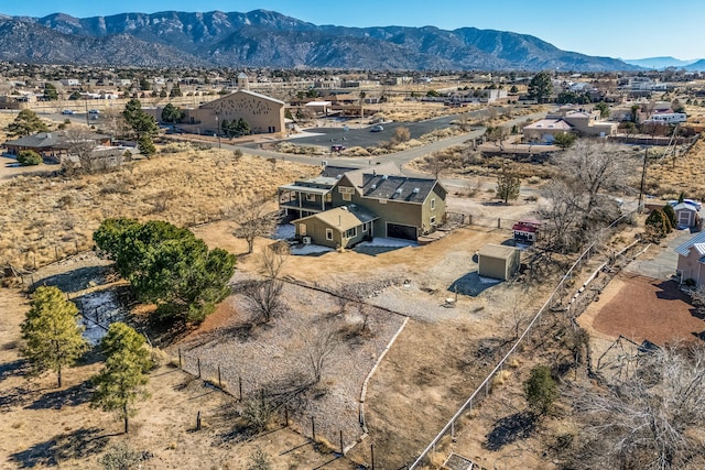 drone / aerial view featuring a mountain view