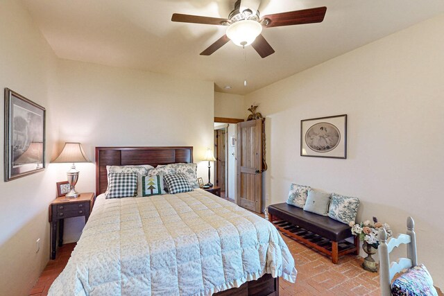 bedroom featuring ceiling fan