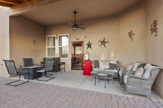 view of patio featuring ceiling fan and an outdoor hangout area