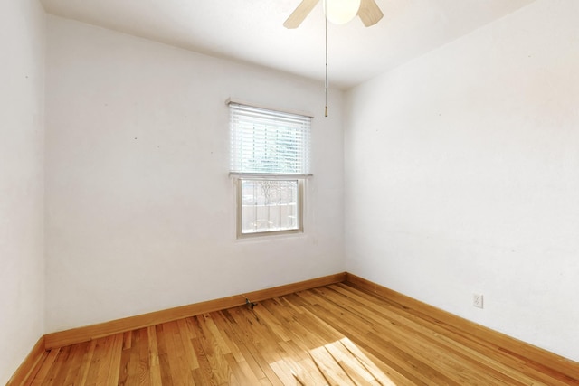 unfurnished room featuring hardwood / wood-style floors and ceiling fan