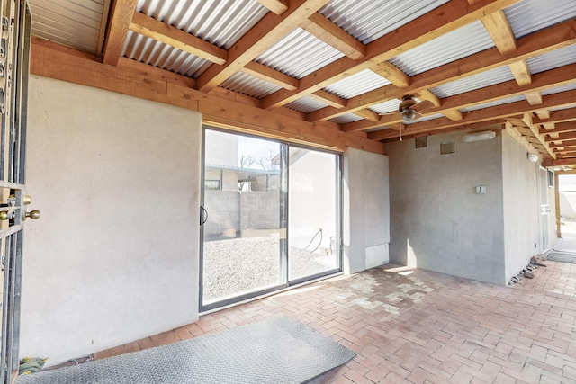 view of patio featuring ceiling fan