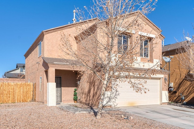 view of front of home featuring a garage