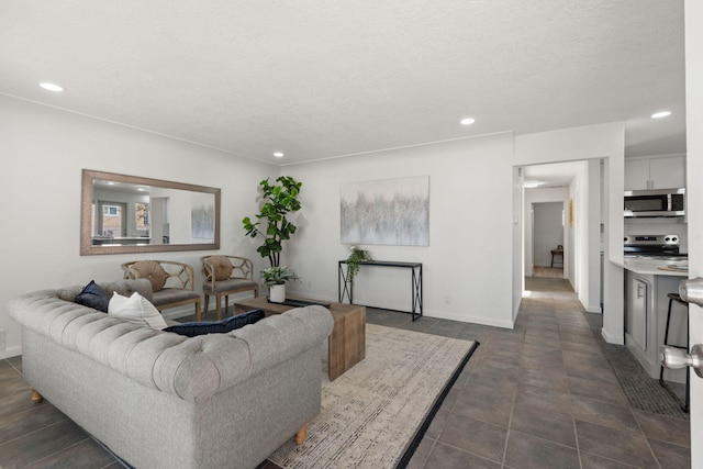 living room with a textured ceiling