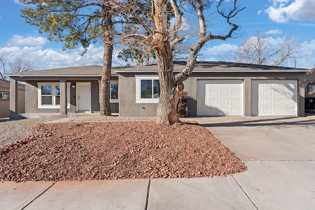 ranch-style home with a garage