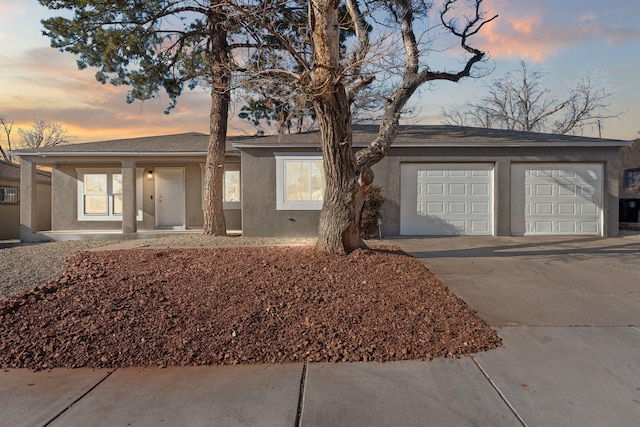 ranch-style home with a garage