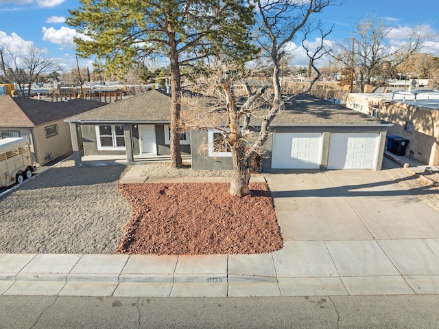 ranch-style home with a garage