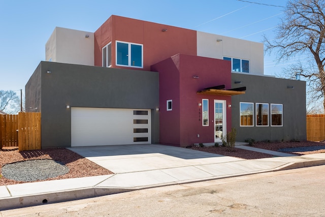 southwest-style home featuring a garage