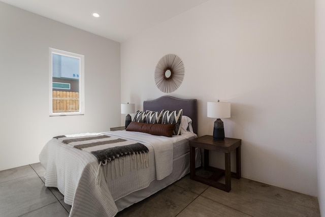 bedroom with concrete floors