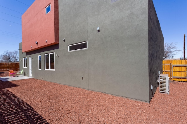 back of house with a patio area