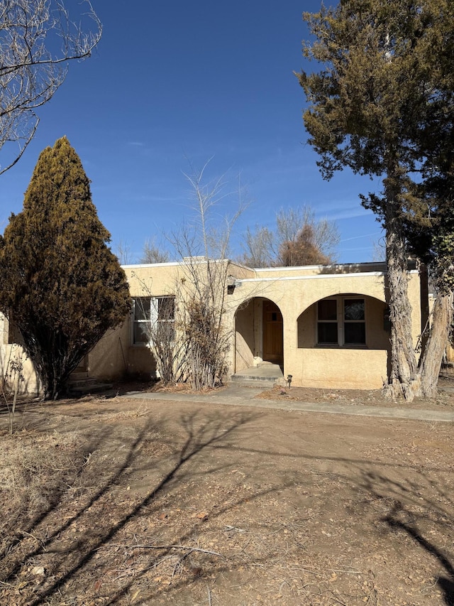 view of front of property featuring stucco siding