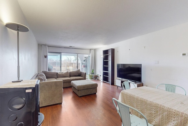 living room with dark wood-type flooring