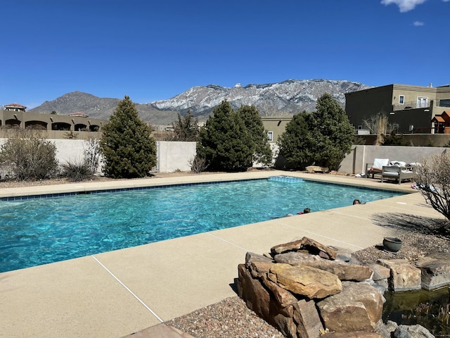 view of pool featuring a mountain view