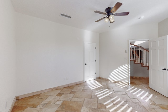 empty room featuring ceiling fan