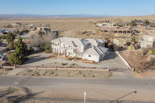 drone / aerial view featuring a mountain view