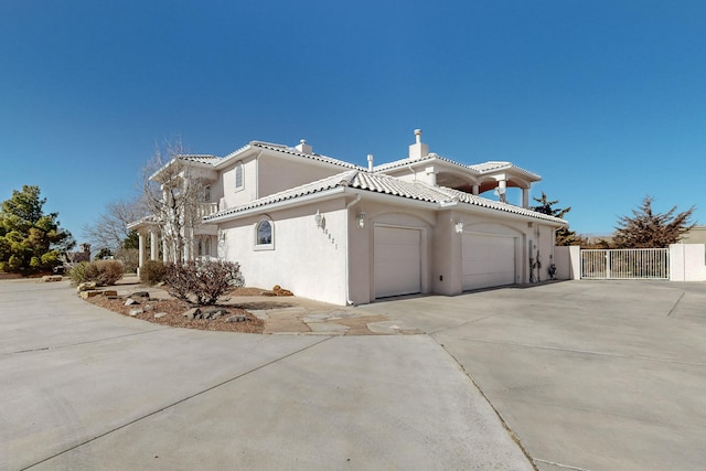 view of side of property featuring a garage