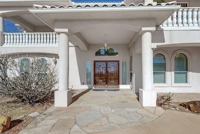 entrance to property featuring french doors