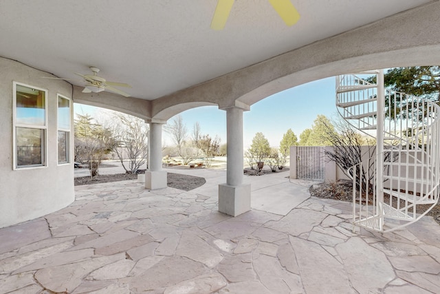 view of patio / terrace featuring ceiling fan