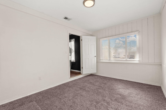 unfurnished bedroom with carpet flooring