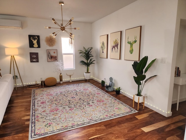 7535 Quemado Ct NE, Albuquerque, NM 87109 - living area featuring a wall unit AC, a notable chandelier, baseboards, and wood finished floors