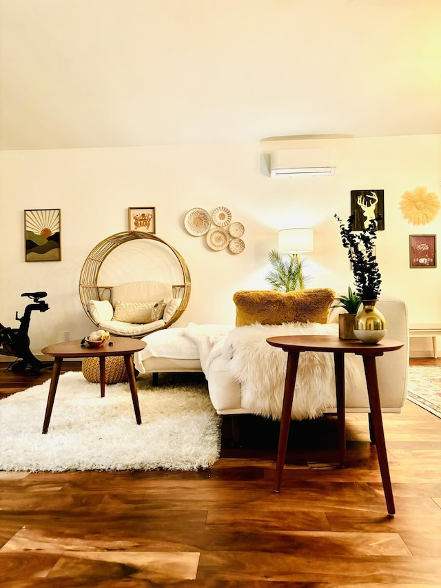 7535 Quemado Ct NE, Albuquerque, NM 87109 - sitting room with a wall unit AC and light wood-style floors