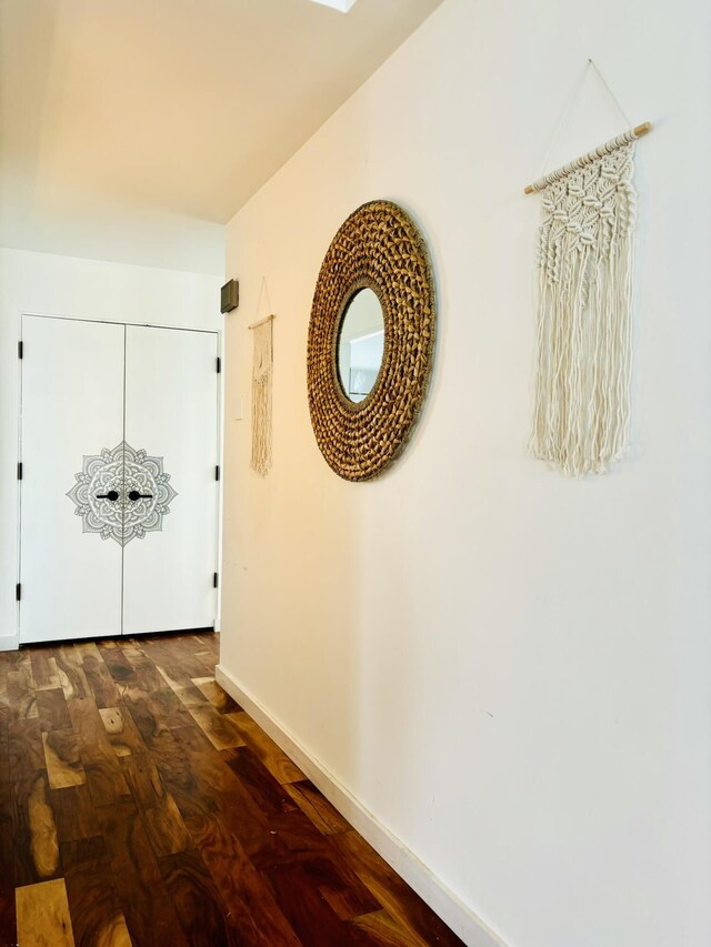 7535 Quemado Ct NE, Albuquerque, NM 87109 - hall with baseboards and dark wood finished floors