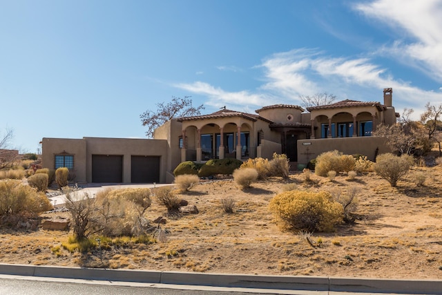 view of front of house with a garage