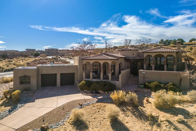 view of front of property with a garage