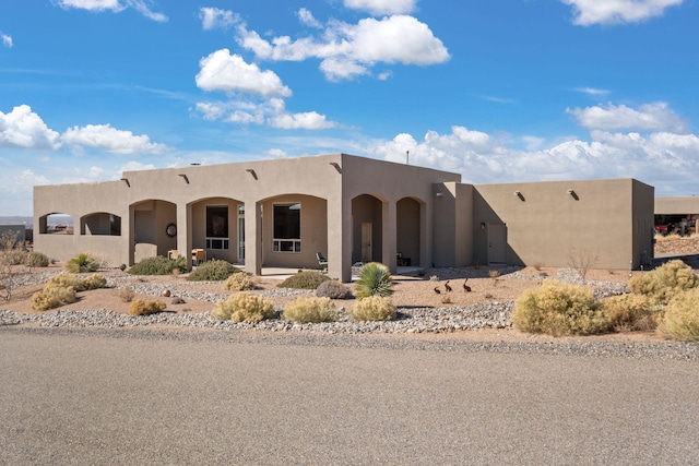 view of pueblo-style home