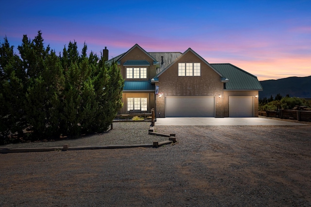 view of front of home featuring a mountain view