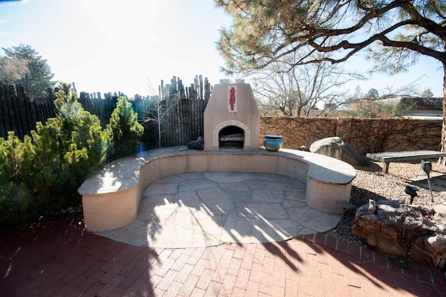 view of patio featuring fence