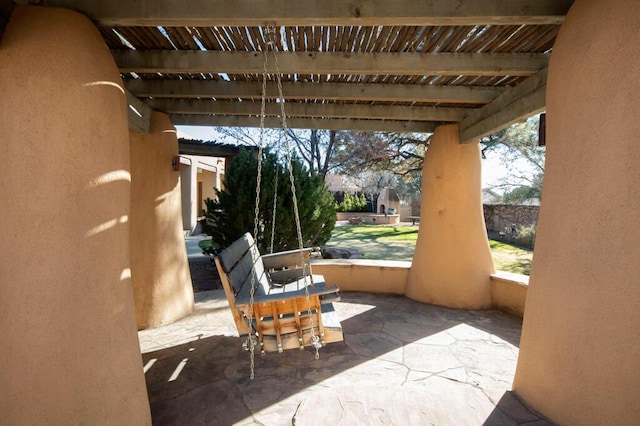 view of patio featuring a pergola