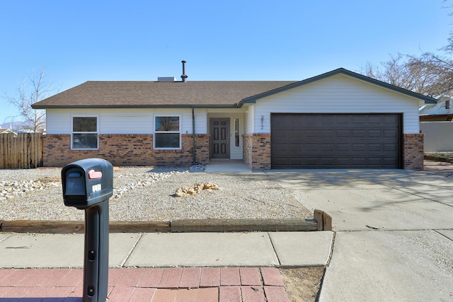 ranch-style home featuring a garage